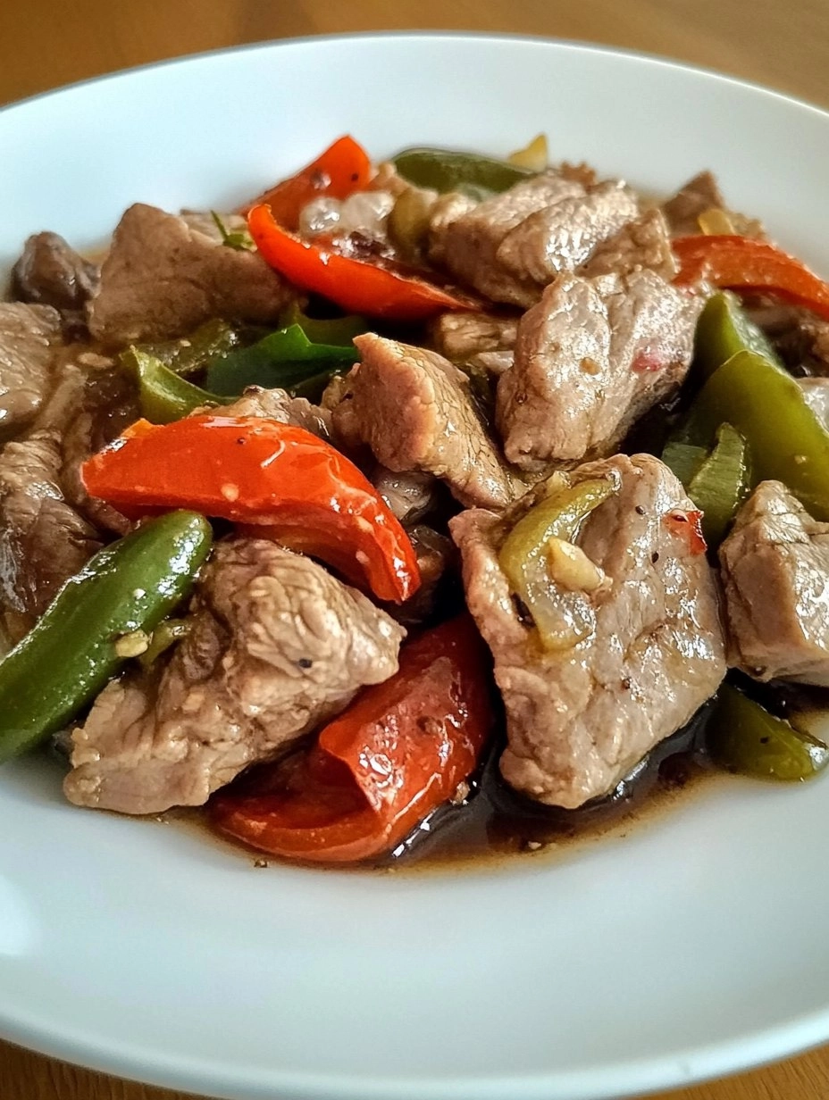 Carne suína com vinagrete de pimentões